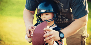 Kid learning football