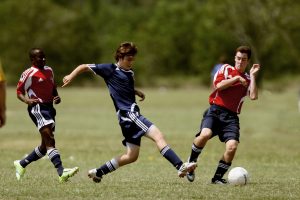 Kids playing soccer; not worried about injuries