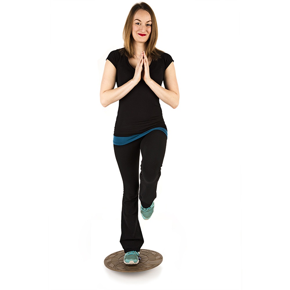 Woman using balance board